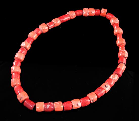 A coral disc necklace, 41cm drop